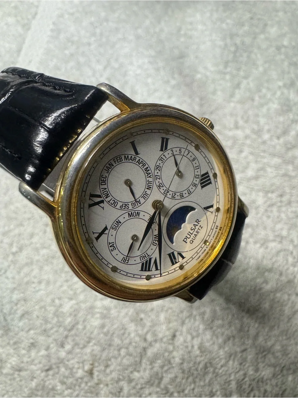 Pulsar Gold-Tone Case White Dial Black Leather Strap Moonphase Watch